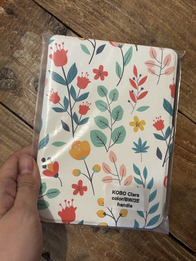 Kobo Clara Floral Case (Category: Laptop Bags & Sleeves) located in Manila. Submitted by mai2019 (Listing ID 1466564368, Image 2). Description: Bought for 349 in orange app Never used Rfs: impulse buy, im no longer in the mood for florals when it arrived (yes, petty😅).