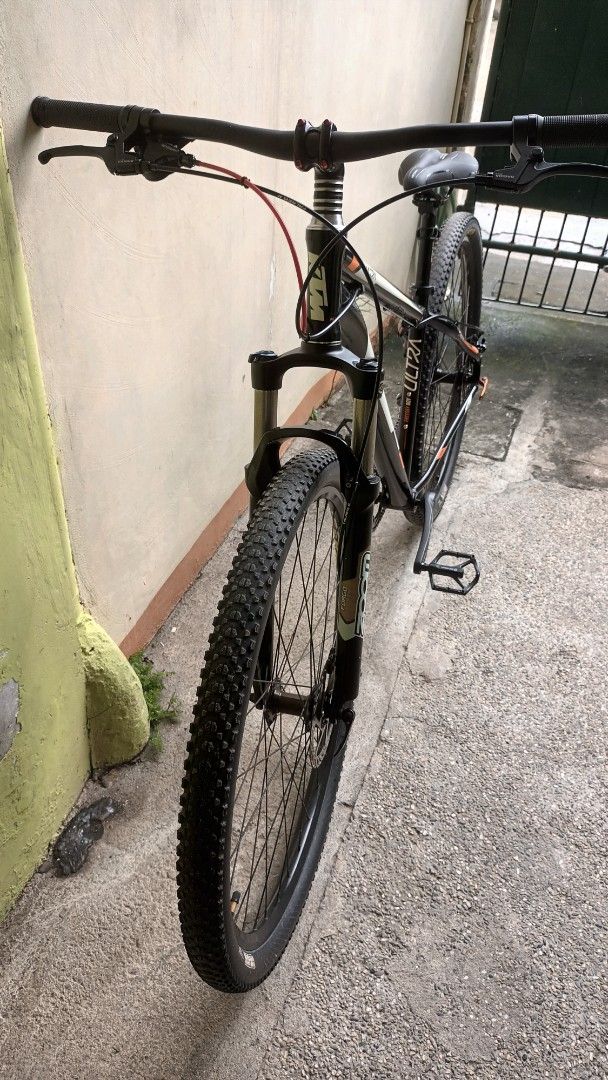 KTM Ultra Mountain Bike (Category: Bicycles) located in Manila. Submitted by fritz2 (Listing ID 1466712724, Image 3). Description: - Brand/Model: KTM Ultra Mountain Bike - Frame: Alloy 6061 (Black & Orange) - Suspension: Zoom fork 29er - Drivetrain: Truvativ crankset - Tires: Maxxis (Front & Rear) size 29 - Brakes: Front and rear mechanical disc brakes issues: some paint scratches but paint still shiny. suspension fork no bounce. - Condition: Rea