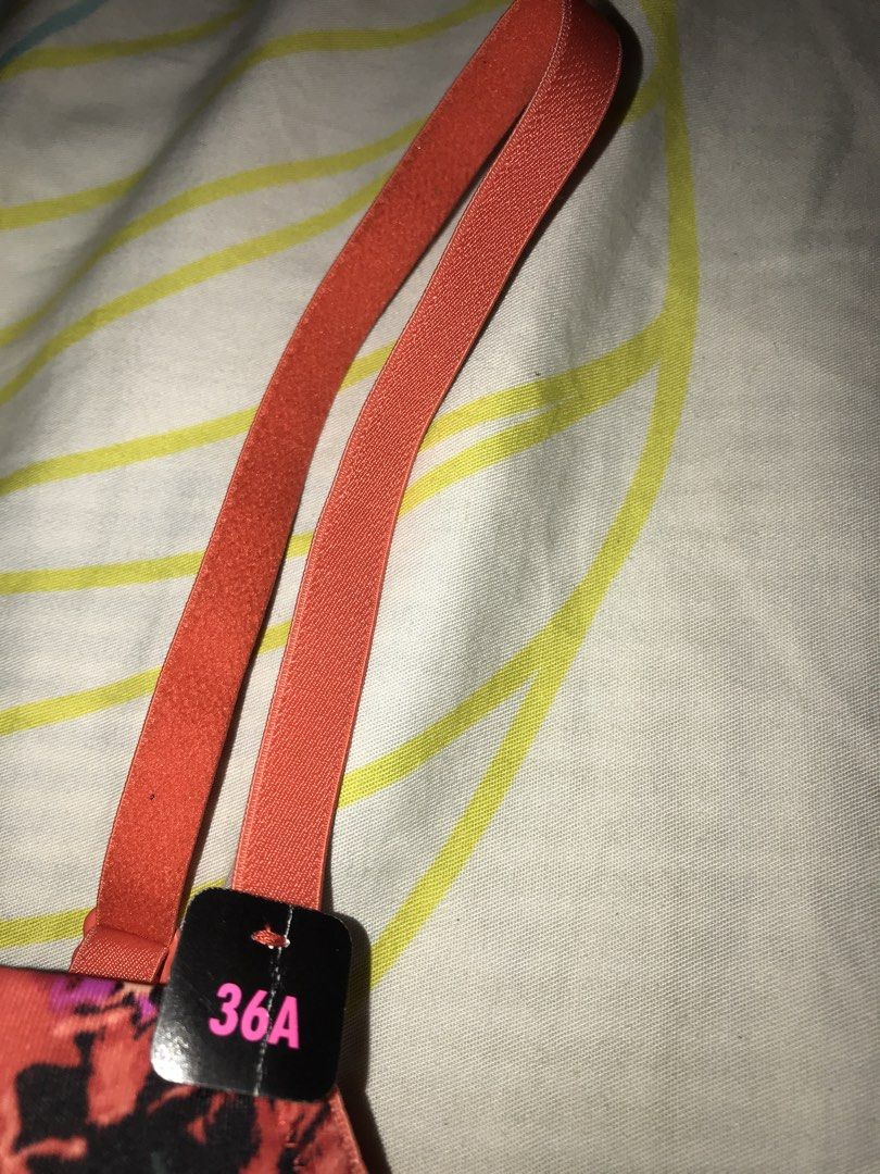 La Senza Floral Push-Up Bra Size 36A (Category: Undergarments & Loungewear) located in Pasig City. Submitted by papotzy (Listing ID 1466623407, Image 3). Description: - Brand new with original tags attached - Vibrant orange color with a dark floral pattern and white striped background - Adjustable straps for a customized fit - Secure hook-and-eye back closure - Chic black bottom band accented with gold metallic thread details.