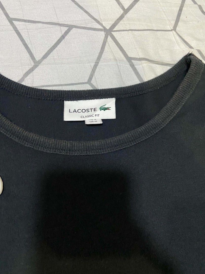 LACOSTE (Category: Tshirts & Polo Shirts ) located in Antipolo. Submitted by goods_thrift (Listing ID 1466769541, Image 3). Description: colorate 9/10 Dimensyon W22.5 L26 issue hole najan yann.