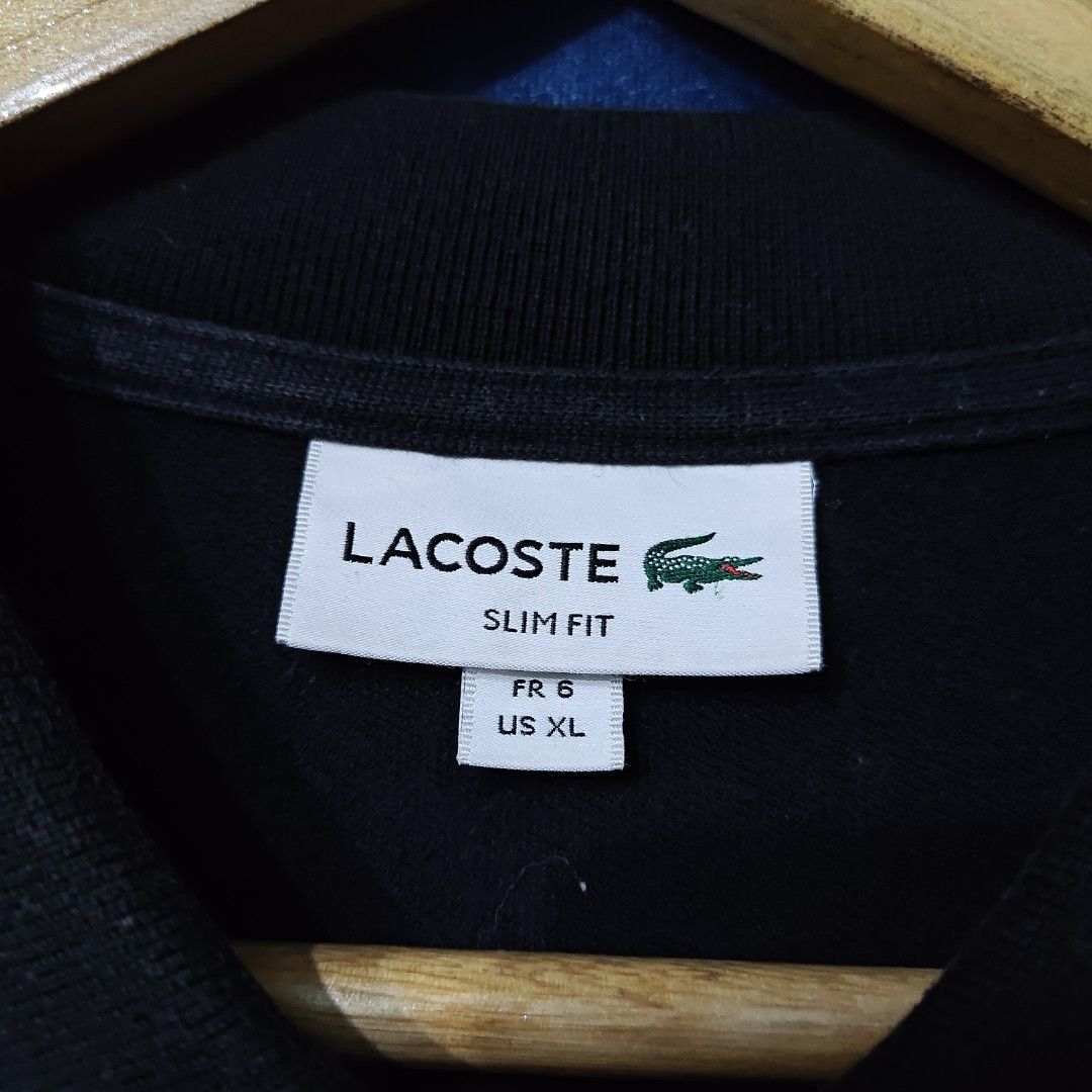 LACOSTE BASIC LOGO POLO SHIRT (Category: Tshirts & Polo Shirts ) located in Makati City. Submitted by upcycled.closeth (Listing ID 1466611569, Image 3). Description: - Authentic Lacoste product - Black / short sleeve - Size: Large to X-large (men's) - Like new - Authentic - flaws: no flaws - Excellent condition - Need wash, fresh from bale - Features design of Lacoste basic logo patch polo shirt - Material: 100% cotton !!STILL NEGOTIABLE!!.