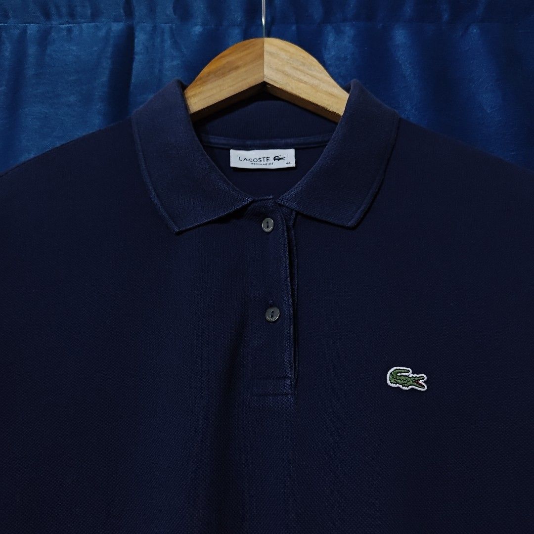 LACOSTE BASIC LOGO POLO SHIRT FOR HER (Category: Others Tops) located in Makati City. Submitted by upcycled.closeth (Listing ID 1466611885, Image 2). Description: - Authentic Lacoste product - Navy blue / short sleeve - Size: medium to large (women's) - Like new - Authentic - flaws: no flaws - Excellent condition - Need wash, fresh from bale - Features design of Lacoste basic logo patch - Material: 100% cotton !!STILL NEGOTIABLE!!.