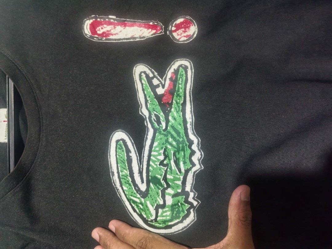 Lacoste big print tshirt (Category: Tshirts & Polo Shirts ) located in Vinzons. Submitted by kspabico07187 (Listing ID 1466717194, Image 3). Description: Verygood condition No crack print L-26 W-20.