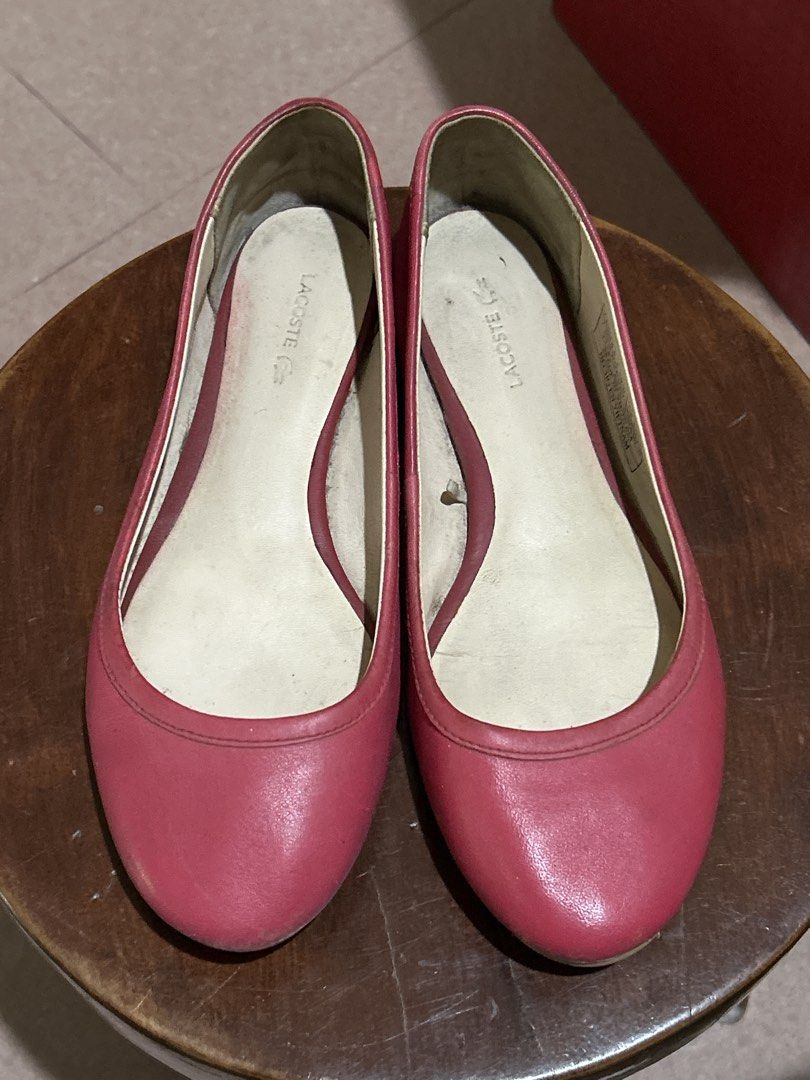 Lacoste Pink Leather Ballet Flats (Category: Flats & Sandals) located in Alitagtag. Submitted by patrickvillanueva (Listing ID 1466615160, Image 2). Description: Pink leather ballet flats from Lacoste. Slip-on style with contrast striped fabric detail running down the heel. Iconic crocodile logo on the side heel. Light cream insoles with Lacoste branding. Signs of wear visible on the inner soles and slight creasing on the leather uppers. Tag insi