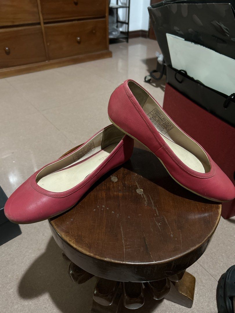 Lacoste Pink Leather Ballet Flats (Category: Flats & Sandals) located in Alitagtag. Submitted by patrickvillanueva (Listing ID 1466615160, Image 3). Description: Pink leather ballet flats from Lacoste. Slip-on style with contrast striped fabric detail running down the heel. Iconic crocodile logo on the side heel. Light cream insoles with Lacoste branding. Signs of wear visible on the inner soles and slight creasing on the leather uppers. Tag insi