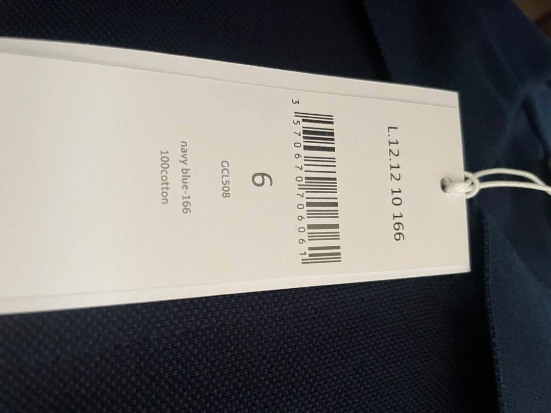 Lacoste Polo Shirt (Category: Tshirts & Polo Shirts ) located in Quezon City. Submitted by _gg06 (Listing ID 1466668602, Image 3). Description: - Brand: Lacoste L.12.12 Classic Fit Polo Shirt - Color: Navy Blue - Size: FR 6 / US XL - Material: 100% Cotton - Condition: Brand new, never worn - Inclusions: Original store tags attached and plastic packaging included RFS: Wrong size. Bought in Lacoste store, Iconsiam Bangkok. .