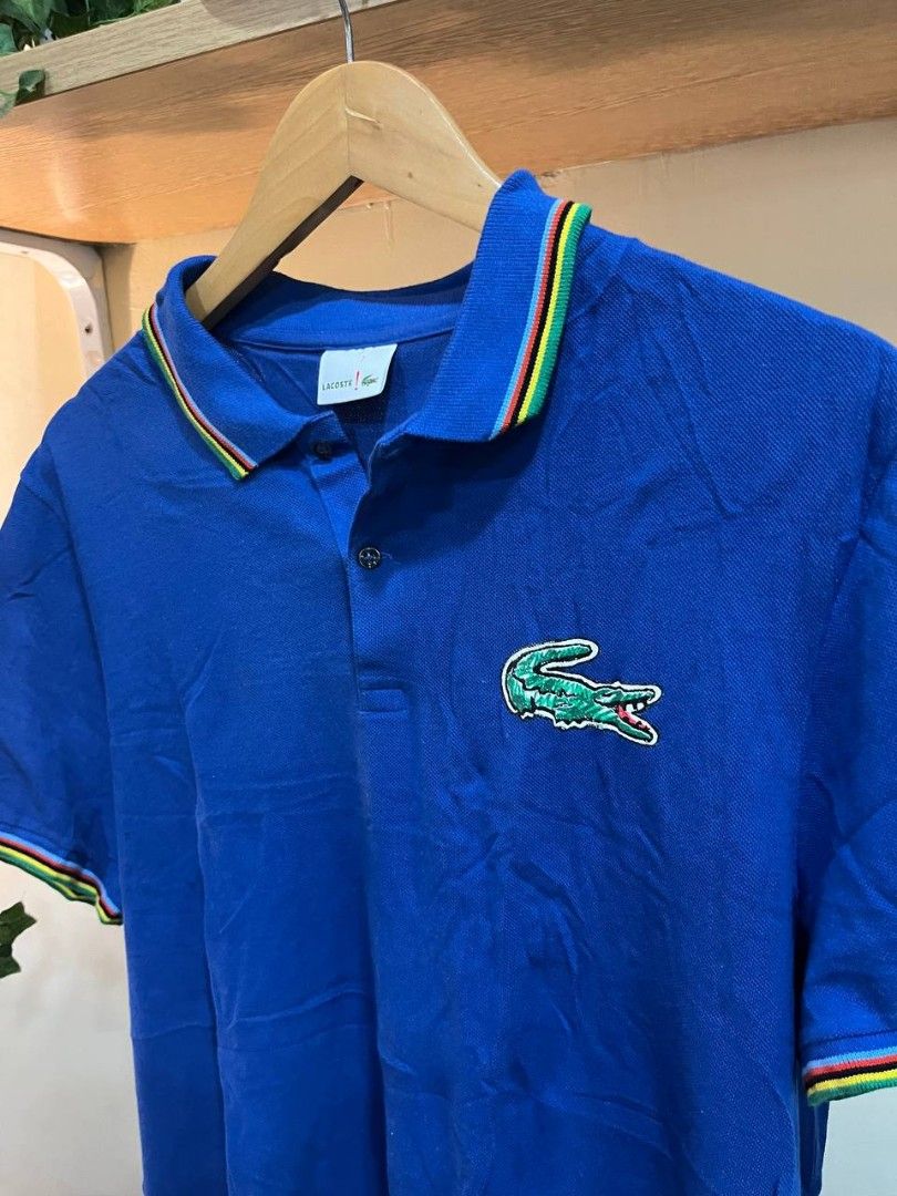 Lacoste Printed Big logo Poloshirt (Category: Activewear) located in Quezon City. Submitted by michypeachyy1 (Listing ID 1466606907, Image 2). Description: 750 plus shipping only XXL size no issues color rate 10/10 dimes 24 inches width 28 inches front length 30 inches back length.