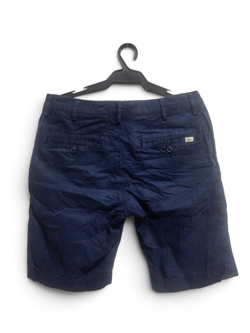 Lacoste walking short (Category: Shorts) located in Vinzons. Submitted by khasanche43622 (Listing ID 1466715262, Image 2). Description: Excellent condition No issue Waist-30 W-18.5.