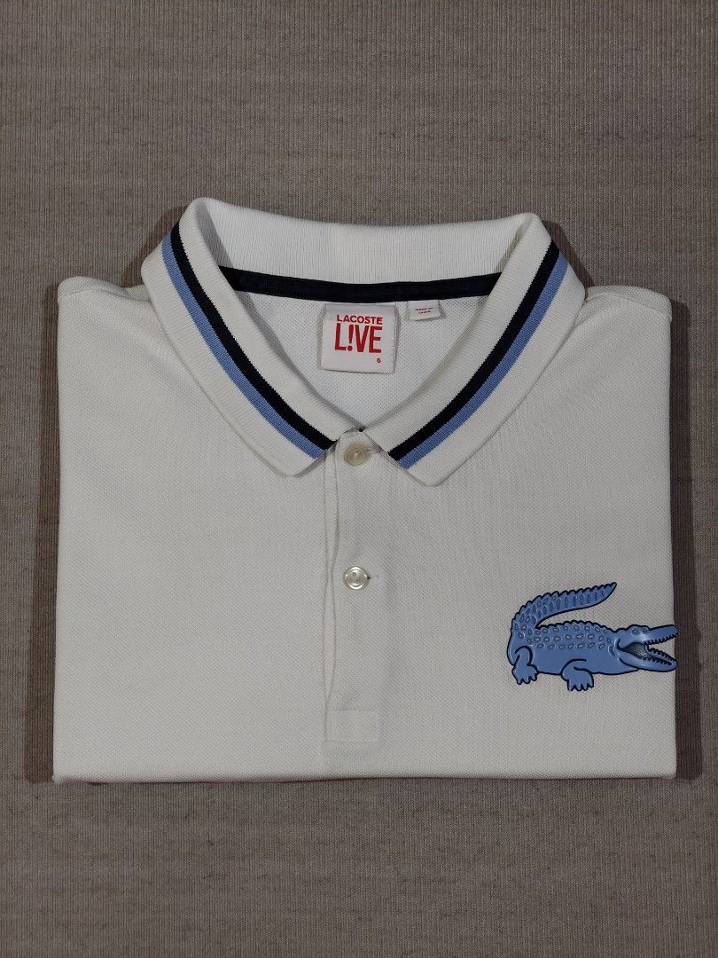 LACOSTE WHITE BIG LOGO (Category: Tshirts & Polo Shirts ) located in Baliuag. Submitted by vk_thrift01 (Listing ID 1466737061, Image 2). Description: LACOSTE BIG LOGO WHITE DIMES: 22 X 27.5 FRONT 28.5 BACK CONDI: EXCELLENT CONDITION COLOR RATE: 9.5/10 ISSUE: MINIMAL FOLD LINES AND SUPER LIGHT STAIN ON THE BACK STILL NEGO JUST MAKE AN OFFER NOTE: ‼️‼️‼️ 📌ALL ITEMS ARE THRIFTED NOT BRANDNEW SO KINDLY MANAGE YOUR EXPECTATIONS. 📌ALL ITEMS ARE NEEDS