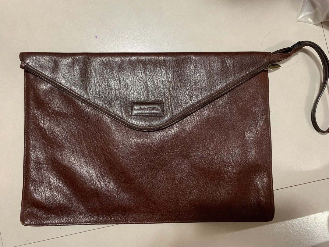 Lancel Paris, featuring an asymmetric envelope flap (Category: Luxury Bags & Wallets) located in Las Pinas. Submitted by kwenbeh (Listing ID 1466581198, Image 1). Description: .