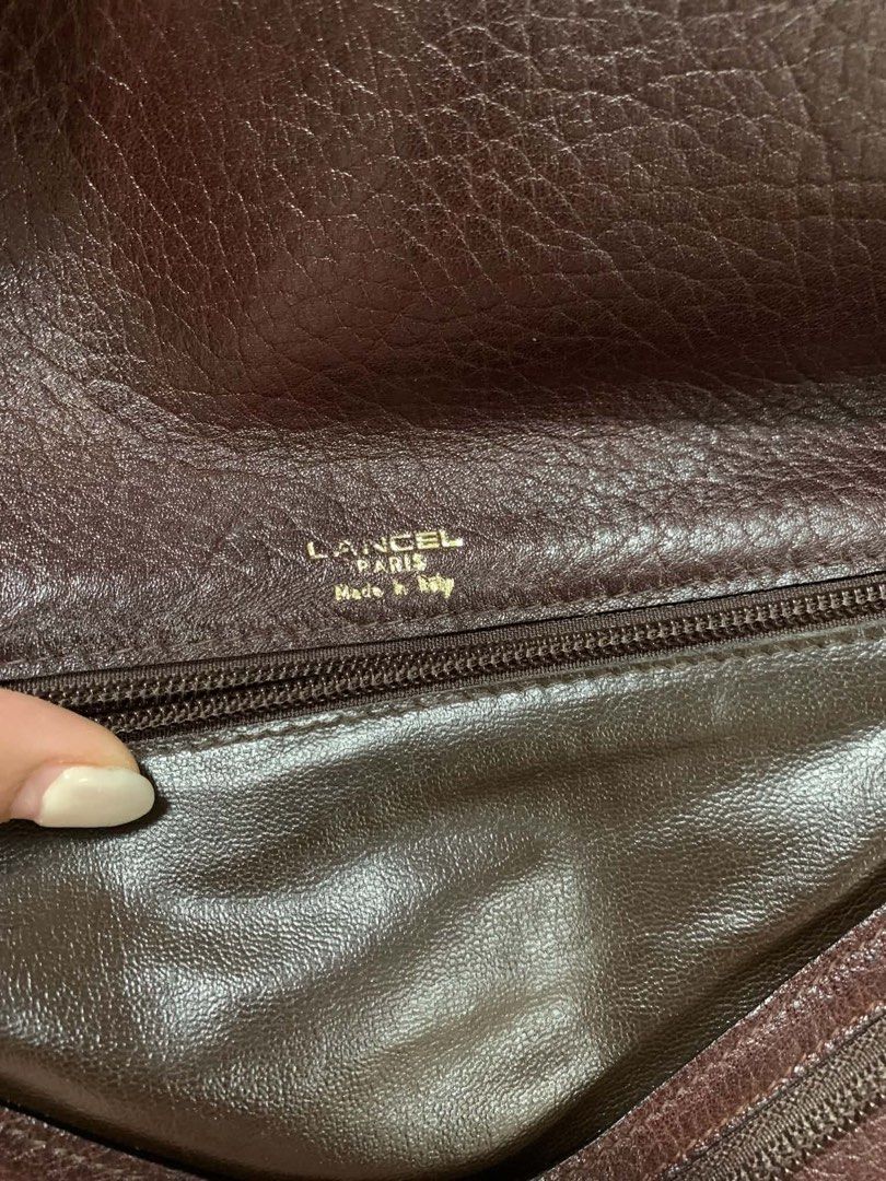 Lancel Paris, featuring an asymmetric envelope flap (Category: Luxury Bags & Wallets) located in Las Pinas. Submitted by kwenbeh (Listing ID 1466581198, Image 2). Description: .