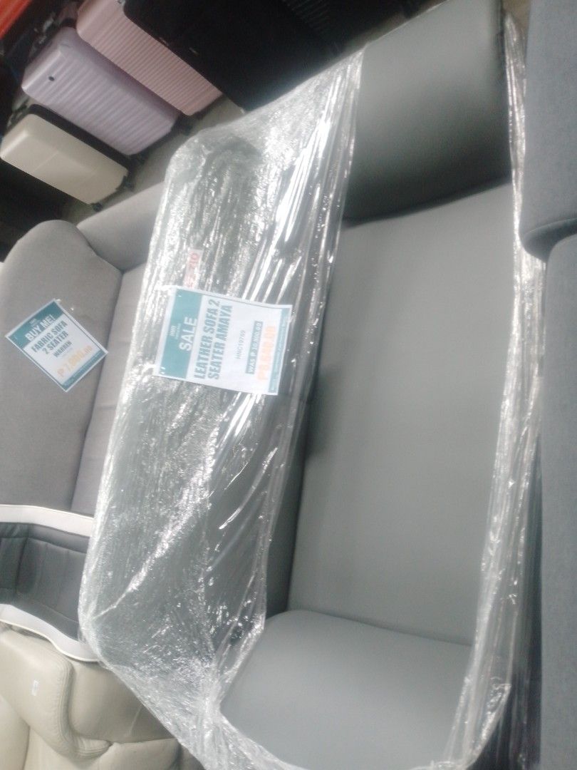 Leather Sofa 2 Seater Amaya Grey (Category: Sofas) located in Manila. Submitted by maryjane09. (Listing ID 1466592607, Image 1). Description: - Model: Amaya 2-Seater Leather Sofa - Color: Grey - Condition: Brand new, still wrapped in original store plastic - Features: Smooth upholstery, comfortable cushioning, space-saving size ideal for apartments and studios - Fulfillment: Ready for pickup or delivery arrangements.