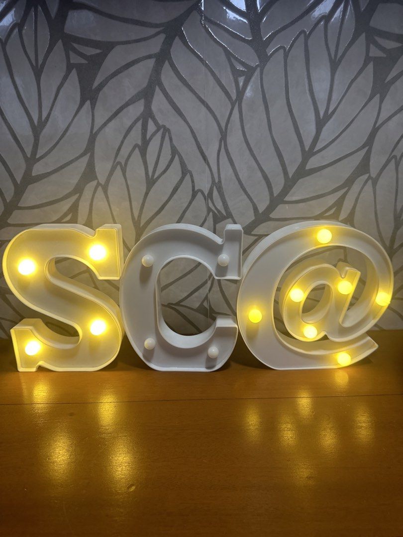 LED Marquee Letters S C @ Light Up Signs (Category: Lighting) located in Makati City. Submitted by twodoxies (Listing ID 1466648576, Image 1). Description: - Letters included: S, C, and @ - bundle price - Material: white plastic with warm yellow LED bulbs - Power: Battery-operated for easy placement - Design: Freestanding and sits flat on any table or flat surface -battery for replacement I have also # 1 and 8.