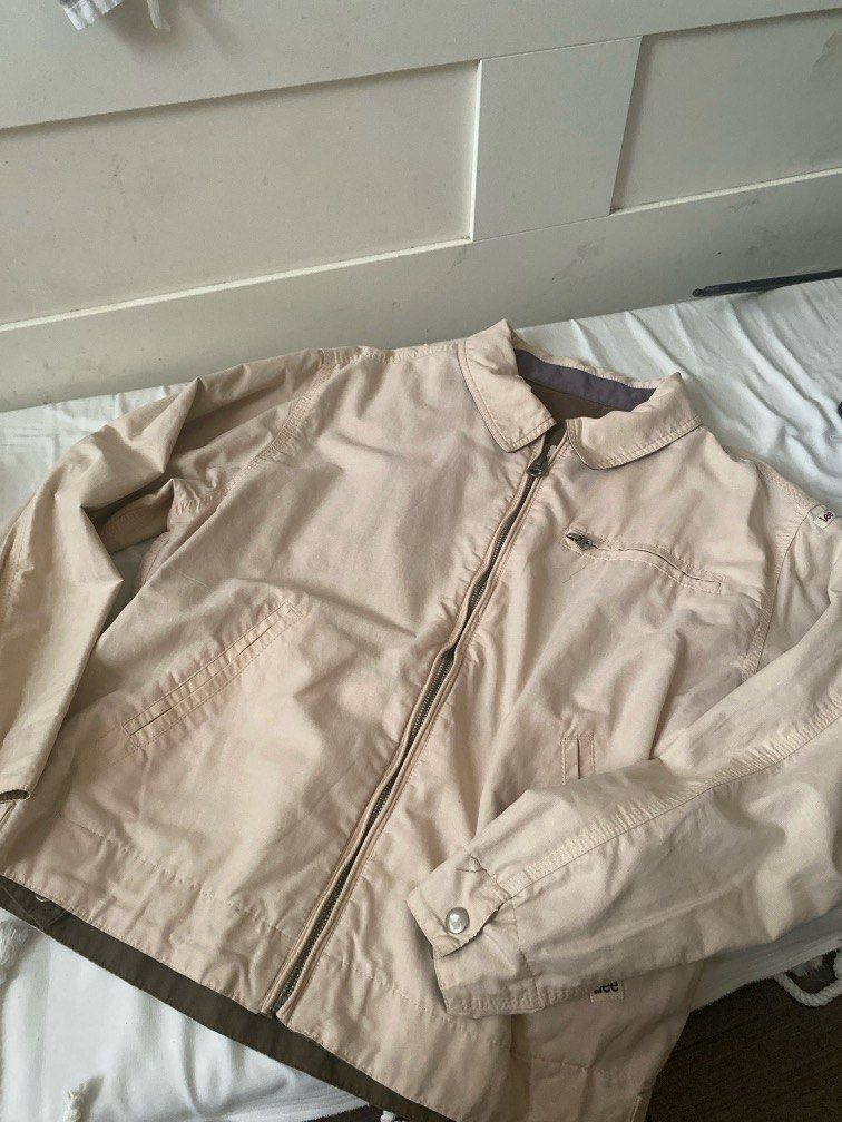 Lee Reversible Jacket Beige Olive Green (Category: Coats, Jackets and Outerwear) located in Makati City. Submitted by sbllia (Listing ID 1466613715, Image 3). Description: - Brand: Lee Denim USA - Style: Reversible jacket (Beige side / Olive green side with big '89' back graphic) - Features: Full zip closure, collar, and functional front pockets on both sides - Condition: Reddish stain on one of the beige sleeves.