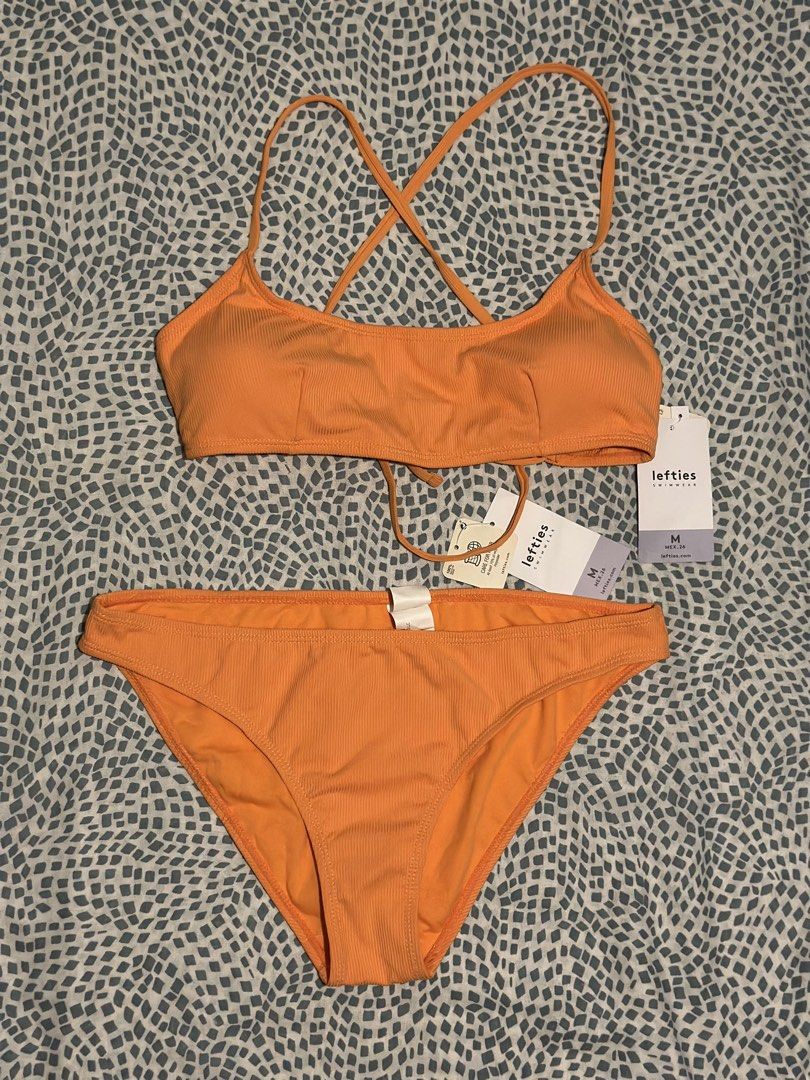 Lefties and Mango Bikini Various Styles (Category: Bikinis & Swimsuits) located in Taguig. Submitted by tinacas018 (Listing ID 1466608656, Image 2). Description: - Variety of styles: Bandeau tops, triangle tops, and adjustable tie-side bottoms - Assorted prints and colors: Solid green, orange, blue, plus a classic striped set and floral print set - Perfect for beach getaways and vacations - Message for inquiries or bundle availability.