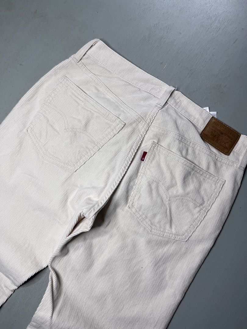 Levi's Corduroy Trousers Off White (Category: Jeans) located in Catbalogan. Submitted by yellfindss (Listing ID 1466752020, Image 2). Description: - Brand: Levi's -28-30/36 lo 8.5 - Color: Off-white - Material/Texture: Soft ribbed corduroy - Style: Classic five-pocket with button fly closure - Details: Brown leather waist patch and signature red tab on the back pocket - Condition/Vibe: Great neutral staple for cooler weather.