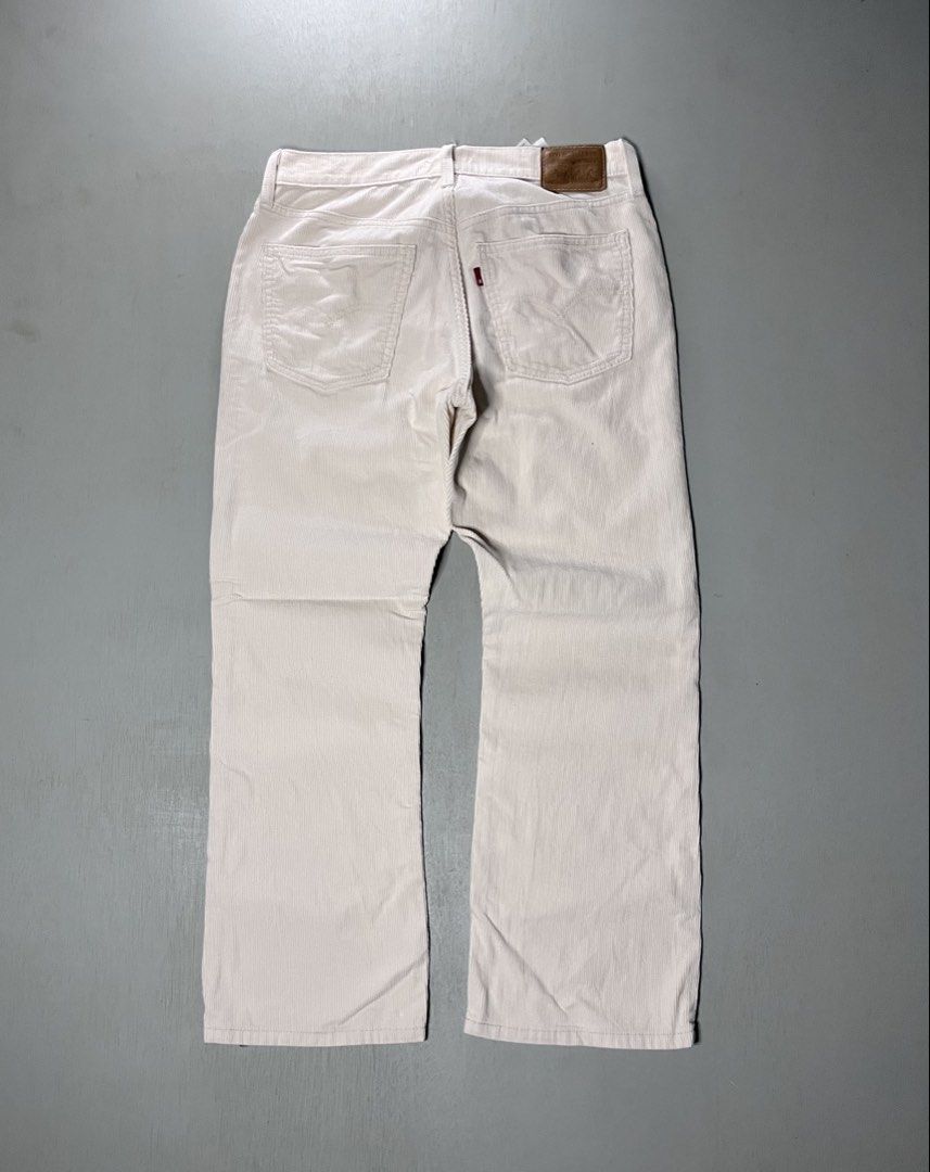 Levi's Corduroy Trousers Off White (Category: Jeans) located in Catbalogan. Submitted by yellfindss (Listing ID 1466752020, Image 1). Description: - Brand: Levi's -28-30/36 lo 8.5 - Color: Off-white - Material/Texture: Soft ribbed corduroy - Style: Classic five-pocket with button fly closure - Details: Brown leather waist patch and signature red tab on the back pocket - Condition/Vibe: Great neutral staple for cooler weather.
