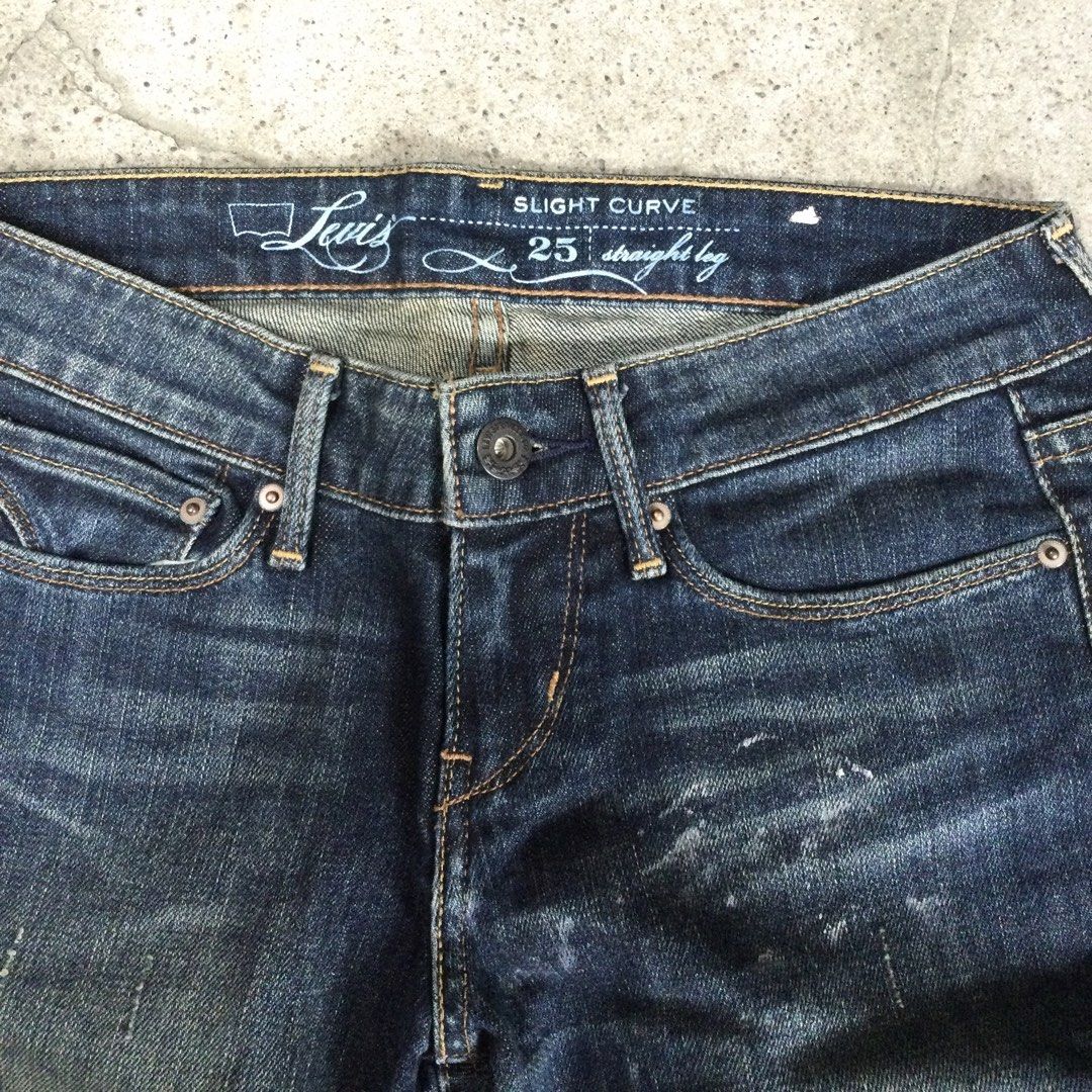 Levi's Slight Curve — Straight Leg Red Tab (Category: Jeans) located in Binangonan. Submitted by ininnep (Listing ID 1466764287, Image 2). Description: Brand: Levi's (Levi Strauss & Co.) Item Details: • Style: Levi's Slight Curve — Straight Leg • Size: W25 L32 (25 waist, 32 length) • Origin: Made in Indonesia • Color: Dark blue wash with subtle fading/distressing • Features: Classic Levi's leather patch, red tab, signature arcuate stitching on ba