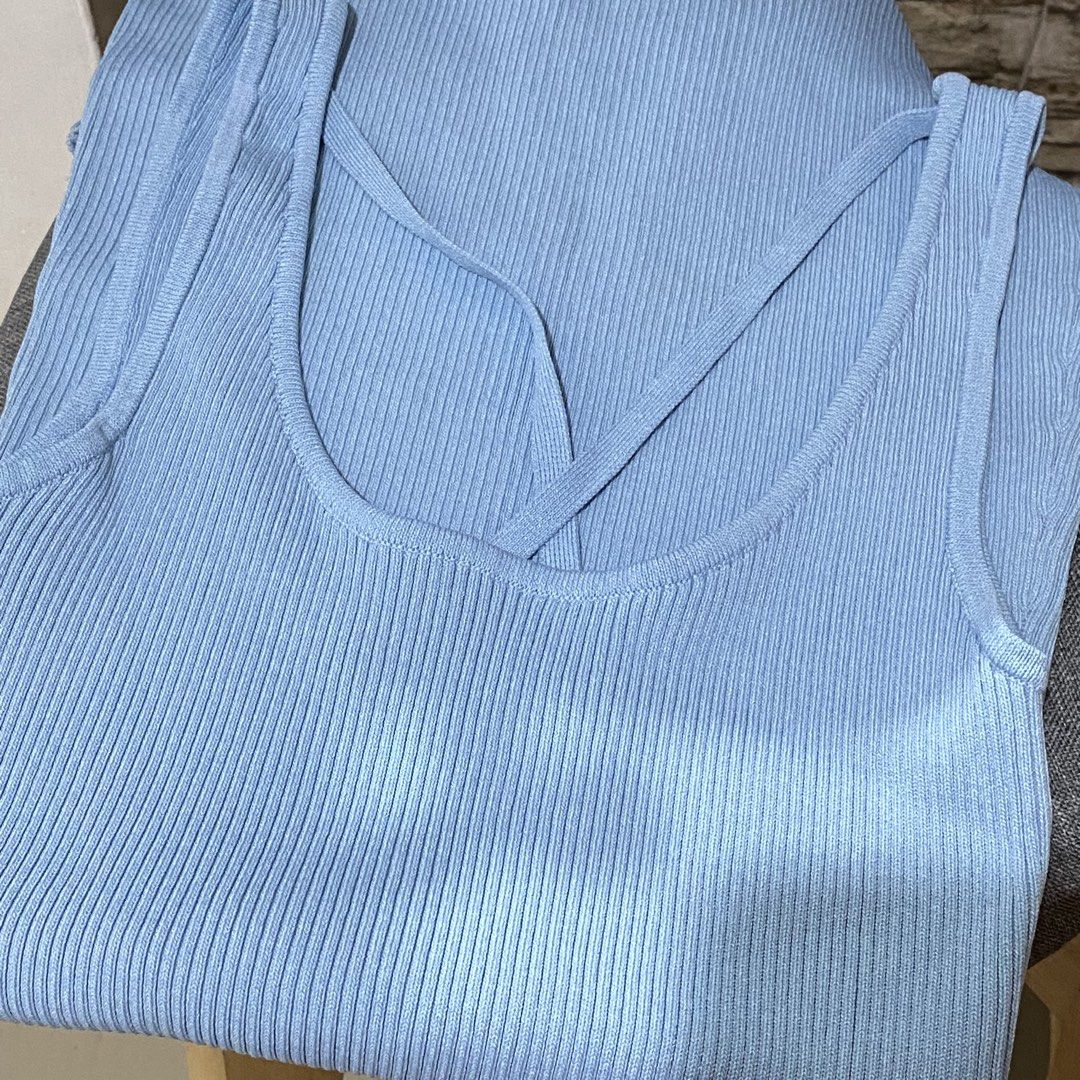Light blue ribbed dress (Category: Sleeveless) located in Cavite. Submitted by helloize (Listing ID 1466618279, Image 1). Description: - Color: Light blue - Material: Soft, stretchy ribbed knit - Design: Unique crisscross strap on the front chest - Fit: Sleeveless and fitted silhouette - Condition: Clean and well-kept - Styling: Great basic for layering or wearing on warm days with crisscross back straps above the knee length Never nagamit since 