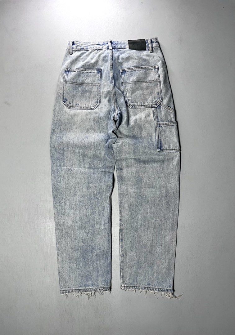 Light wash carpenter denim jeans with distressed hems (Category: Jeans) located in Catbalogan. Submitted by yellfindss (Listing ID 1466751021, Image 1). Description: - Style: Streetwear relaxed fit carpenter jeans -30-32/41 lo 7 - Wash: Light wash denim - Details: Double-knee panels, utility pockets, and a back leather patch - Finishing: Distressed front panels and frayed hems.