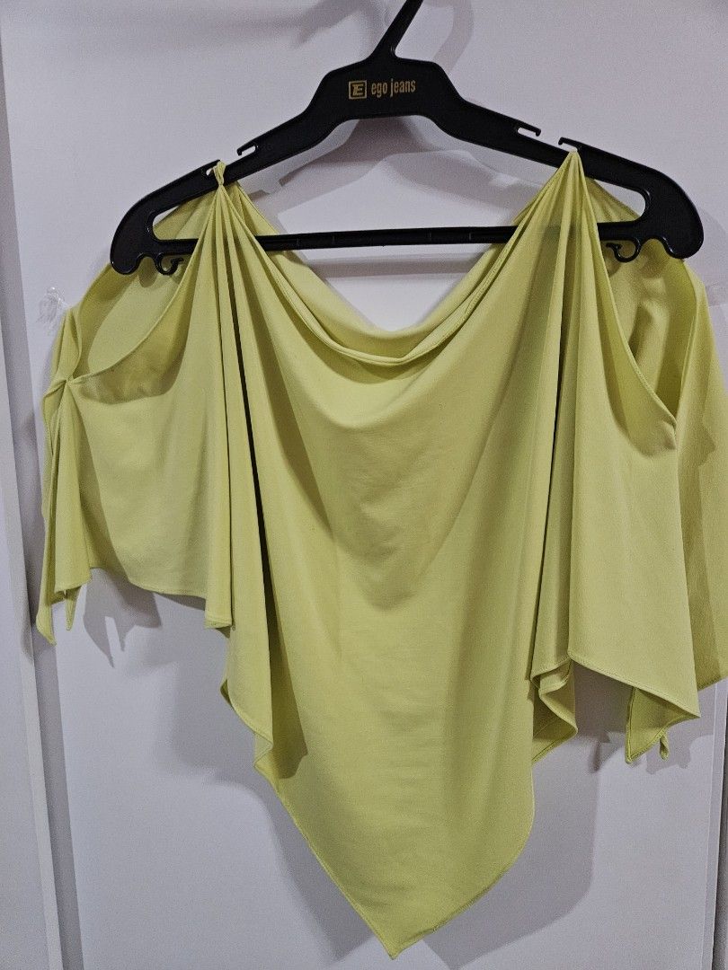 Lime green sleeveless draped top (Category: Sleeveless) located in Caloocan City. Submitted by rm.diaz (Listing ID 1466751156, Image 2). Description: - Color: Bright pastel lime green - Design: Sleeveless with unique gathered side detail - Fit: Flowy, lightweight, and comfortable for warm weather - Styling: Easily pairs with high-waist jeans or skirts - Condition: Brand new / Excellent.