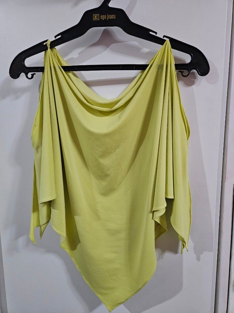 Lime green sleeveless draped top (Category: Sleeveless) located in Caloocan City. Submitted by rm.diaz (Listing ID 1466751156, Image 1). Description: - Color: Bright pastel lime green - Design: Sleeveless with unique gathered side detail - Fit: Flowy, lightweight, and comfortable for warm weather - Styling: Easily pairs with high-waist jeans or skirts - Condition: Brand new / Excellent.