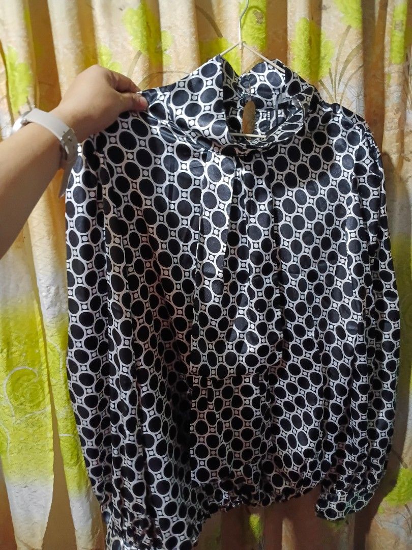 Lipstick Black White Geometric Pattern Blouse (Category: Blouses) located in Quezon City. Submitted by bangbang_87 (Listing ID 1466701735, Image 1). Description: - Brand: Lipstick - Design: Black and white geometric circle print - Details: High neckline with back button closure, long sleeves with gathered details - Fabric: Smooth with a slight sheen - Size: EUR XL, USA L - Origin: Made in Hong Kong.