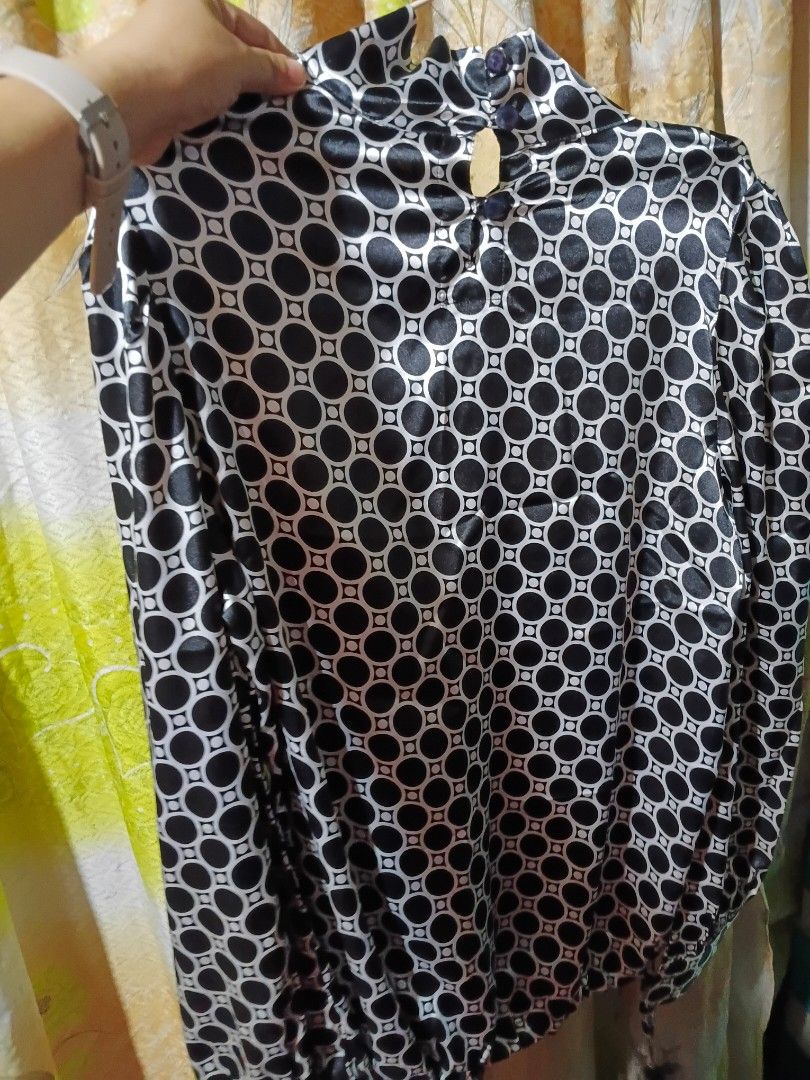 Lipstick Black White Geometric Pattern Blouse (Category: Blouses) located in Quezon City. Submitted by bangbang_87 (Listing ID 1466701735, Image 2). Description: - Brand: Lipstick - Design: Black and white geometric circle print - Details: High neckline with back button closure, long sleeves with gathered details - Fabric: Smooth with a slight sheen - Size: EUR XL, USA L - Origin: Made in Hong Kong.