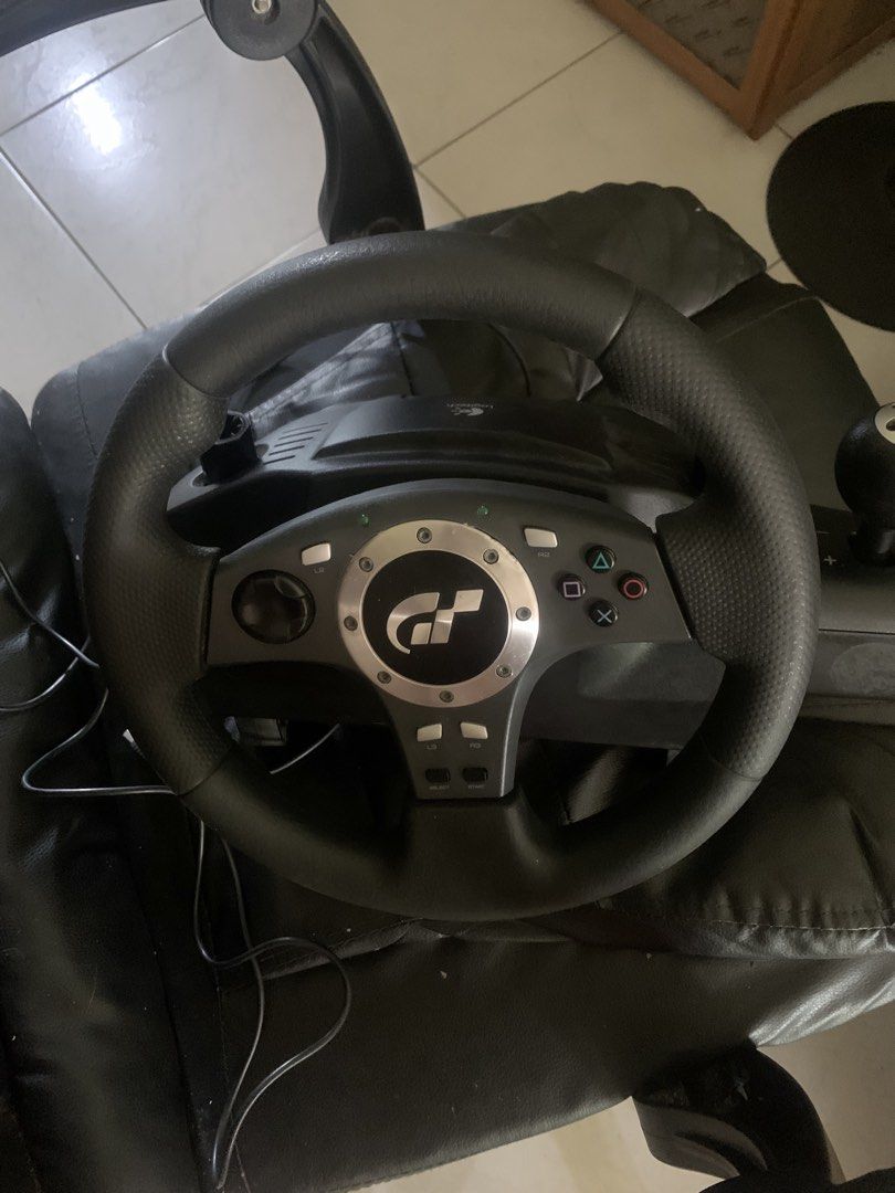 Logitech Driving Force Pro Force Feedback Wheel (Category: Controllers) located in Manila. Submitted by matabangpusa (Listing ID 1466601187, Image 2). Description: LOGITECH DRIVING FORCE PRO (DFP) 900° FORCE FEEDBACK RACING WHEEL + PEDALS 💰 PRICE: ₱4,500 NEGOTIABLE Selling my Logitech Driving Force Pro (DFP) racing wheel. -Mint condition / very clean -All buttons tested and working -Full 900° steering rotation working perfectly -Strong Force Fee