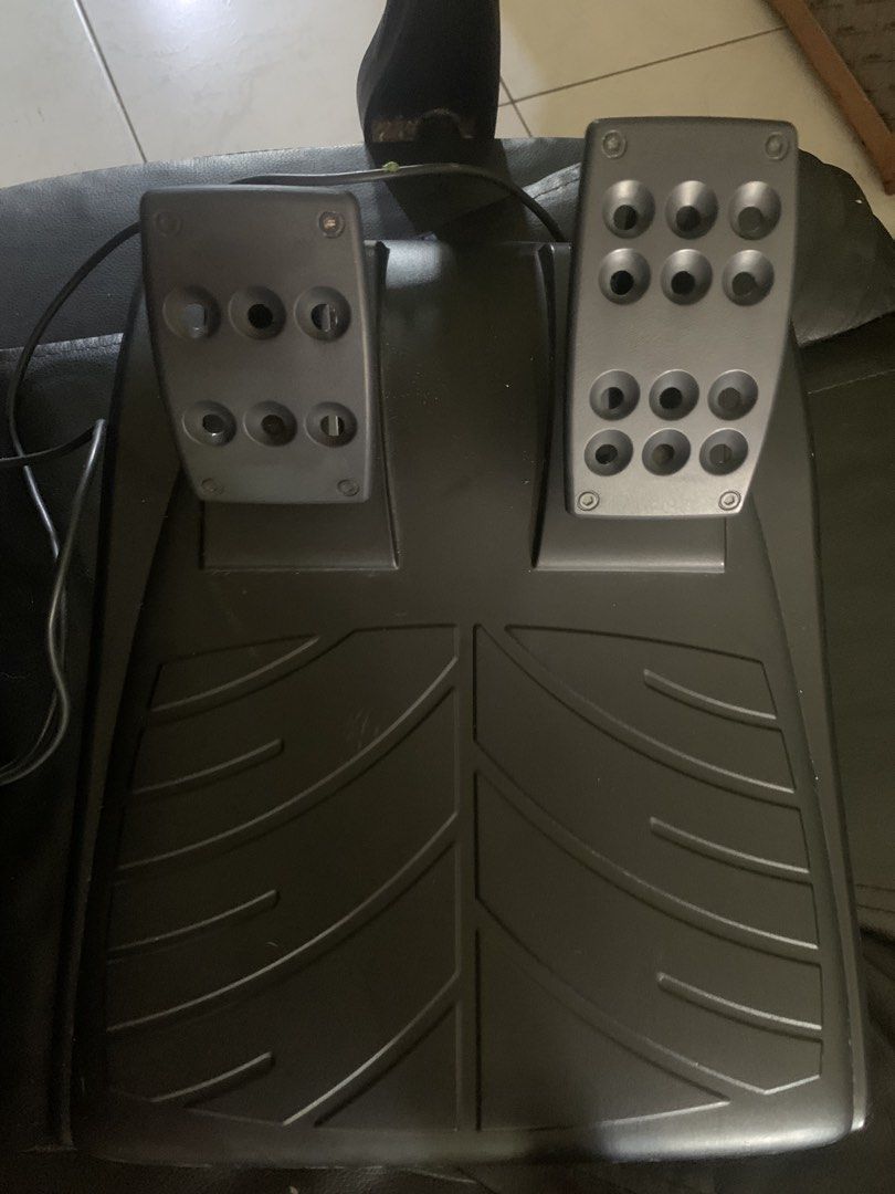 Logitech Driving Force Pro Force Feedback Wheel (Category: Controllers) located in Manila. Submitted by matabangpusa (Listing ID 1466601187, Image 3). Description: LOGITECH DRIVING FORCE PRO (DFP) 900° FORCE FEEDBACK RACING WHEEL + PEDALS 💰 PRICE: ₱4,500 NEGOTIABLE Selling my Logitech Driving Force Pro (DFP) racing wheel. -Mint condition / very clean -All buttons tested and working -Full 900° steering rotation working perfectly -Strong Force Fee