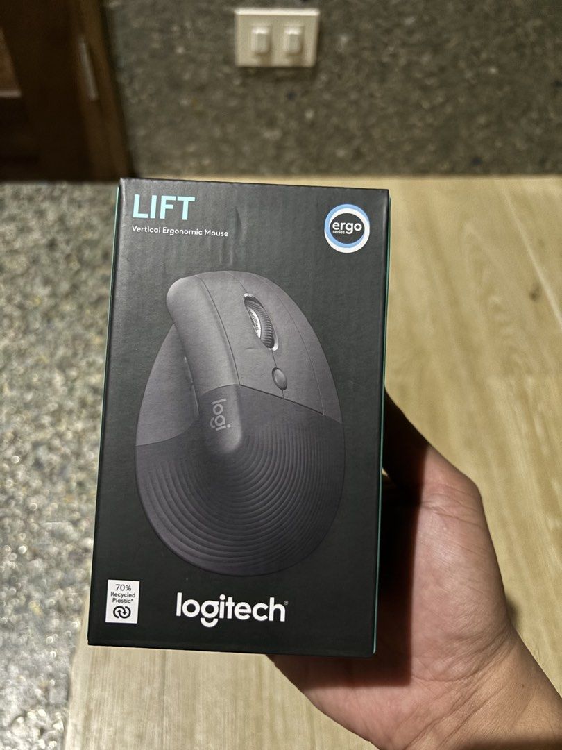 Logitech Mouse Lift Vertical Ergonomic Wireless for PC and Mac Laptop Apple Authentic Bluetooth (Category: Mouse & Mousepads) located in Manila. Submitted by heyitsheavs (Listing ID 1466681565, Image 1). Description: - Brand: Logitech Lift Vertical Ergonomic Mouse - Condition: Brand new, box packaging still sealed and intact - Ergonomics: Designed for better wrist posture during long hours at the computer - Features: Smooth top scroll wheel, slee