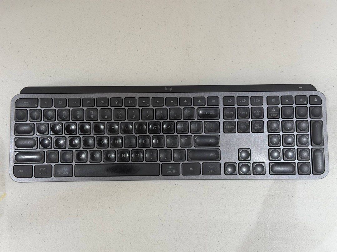 Logitech MX Keys S Wireless Illuminated Keyboard (Category: Computer Keyboard) located in Makati City. Submitted by ajbt13 (Listing ID 1466614204, Image 3). Description: - Model: Logitech MX Keys S Wireless Keyboard - Color: Graphite - Layout: Full-size with numeric keypad - Features: Advanced smart backlighting and Easy-Switch technology for multiple devices - Inclusions: Original retail box, charging cable, and Logi Bolt receiver - Condition: E