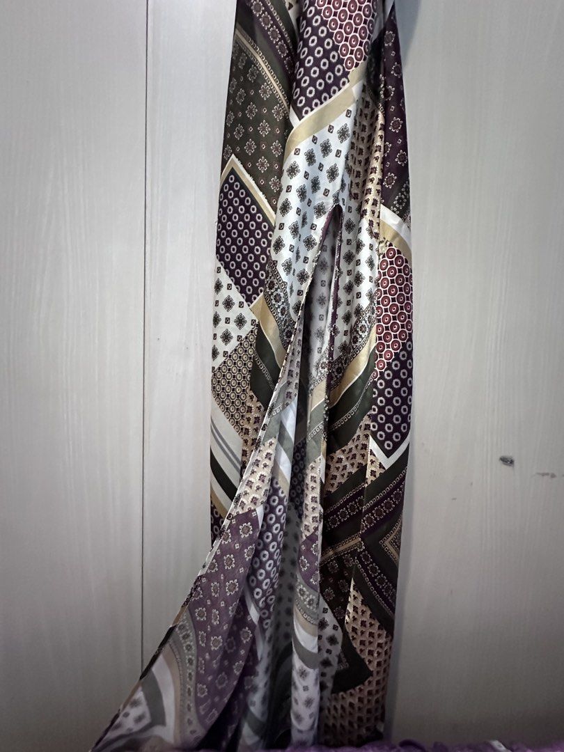 Maxi Long Patchwork Pattern Slip Dress (Category: Dresses) located in Quezon City. Submitted by yani_gleich (Listing ID 1466711340, Image 2). Description: * Style: Long maxi dress with thin spaghetti straps and a flattering V-neckline * Design: Mixed patchwork featuring geometric and traditional-inspired patterns * Colorway: Rich shades of burgundy, olive green, cream, and brown * Material: Smooth satin-like fabric with a gorgeous, flowy drape * 