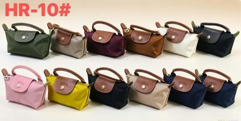 Longchamp Le Pliage Extra Small Handbag Various Colors (Category: Luxury Bags & Wallets) located in Manila. Submitted by jonalyn19 (Listing ID 1466649732, Image 1). Description: - Authentic Longchamp mini top handle bag - Available in multiple colors - Material: Nylon body with signature leather flap and handles - Includes removable shoulder strap for versatile wear - Complete with tag and dust bag - Perfect compact size for daily essentials or q
