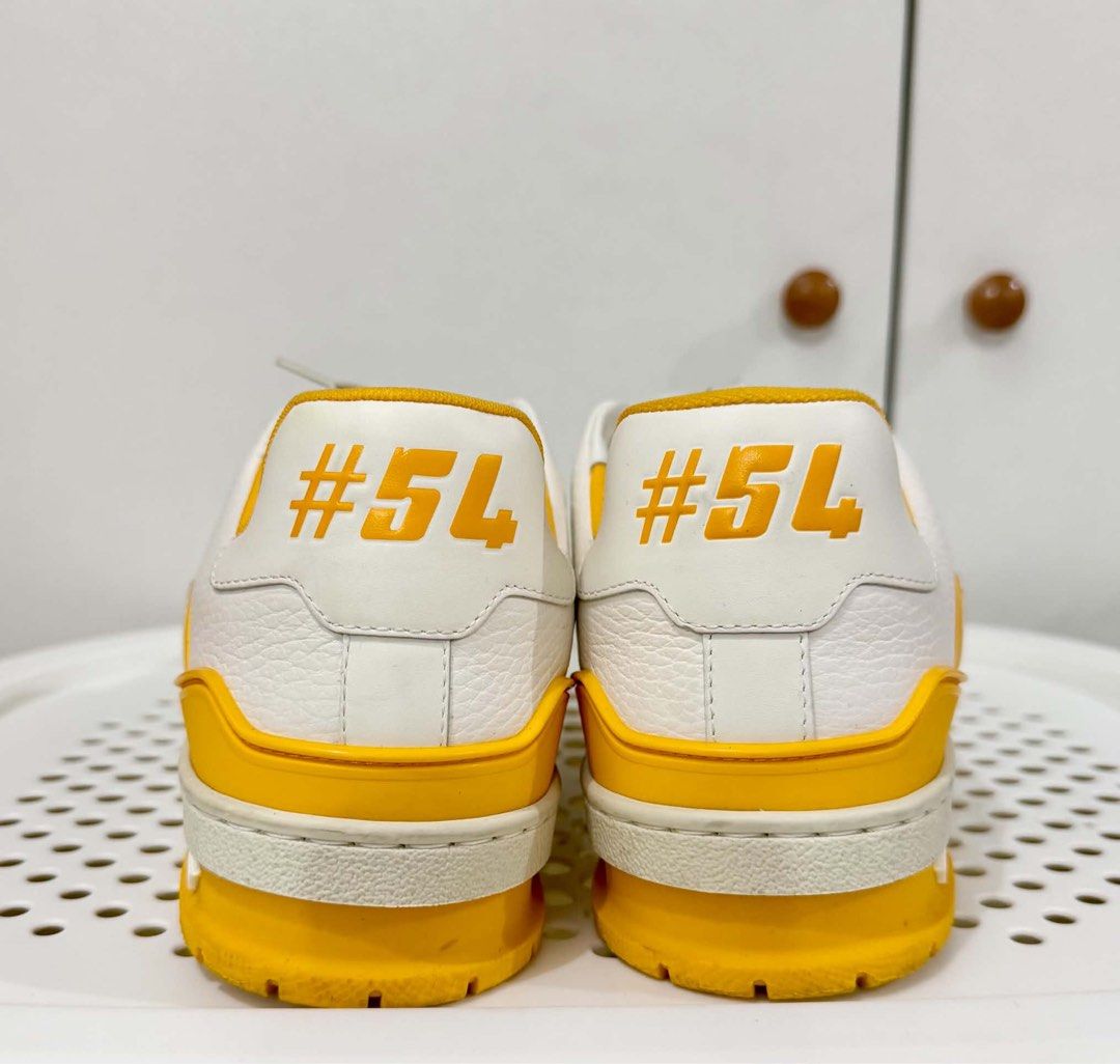 Louis Vuitton LV Trainer White Yellow (AUTHENTIC) (Category: Sneakers) located in Manila. Submitted by wahunnit37468 (Listing ID 1466658344, Image 2). Description: Louis Vuitton LV Trainer sneakers in white and yellow. FOR CONDITION PLEASE REFER TO THE PHOTOS (no box only dustbag) Manda Area 25k shipped slight nego PM! .