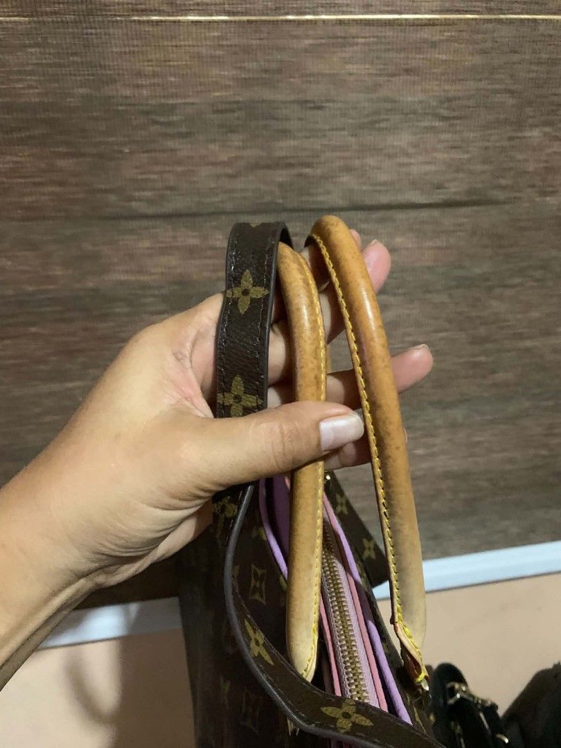 Louis Vuitton Monogram Canvas Handbag with Pink Interior (Category: Luxury Bags & Wallets) located in Aliaga. Submitted by akishaoshop2010. (Listing ID 1466594972, Image 3). Description: - Authentic Louis Vuitton Monogram canvas shoulder bag - Classic brown monogram coated canvas with elegant light pink leather interior lining and top trim - Dual rolled leather top handles with a lovely patina - Includes a detachable monogram shoulder strap for v