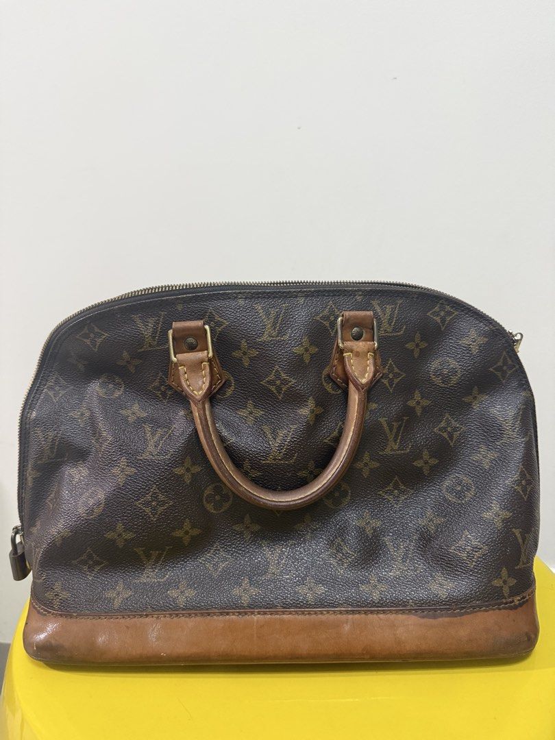 Louis Vuitton Monogram Canvas Alma Handbag (Category: Luxury Bags & Wallets) located in Quezon City. Submitted by sbcarrot (Listing ID 1466691844, Image 1). Description: Well used, authentic • Model: Alma PM (structured Art Deco-inspired silhouette) • Material: Monogram coated canvas with vachetta leather base and handles • Dimensions: Approximately 32 x 25 x 16 cm (12.6 x 9.8 x 6.3 inches).