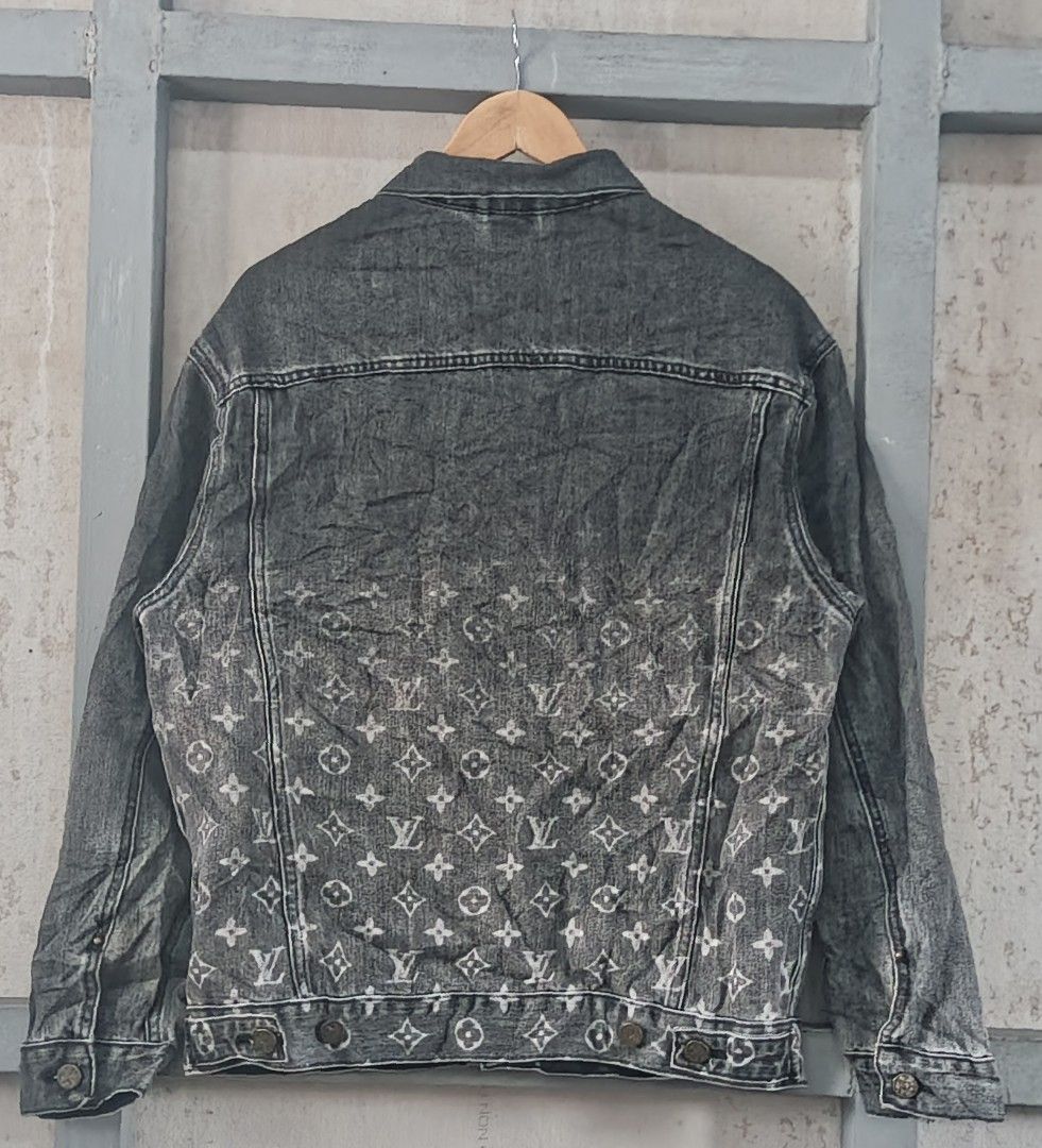 Louis Vuitton Monogram Denim Jacket Size 48 (Category: Coats, Jackets and Outerwear) located in Muntinlupa City. Submitted by thriftben (Listing ID 1466587203, Image 2). Description: - Brand: Louis Vuitton - Style: Dark grey wash denim jacket with fading monogram pattern - Size: 48 (Made in Italy) - Material: 100% cotton (shell and lining) - Features: Button front closure, chest flap pockets, side welt pockets - Care: Gentle dry clean only - Cond