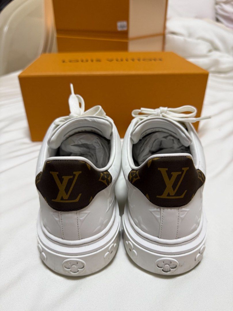 Louis Vuitton Monogram Heel White Sneakers (Category: Sneakers) located in San Juan City. Submitted by krishvee (Listing ID 1466733233, Image 3). Description: LOUIS VUITTON Time Out Sneakers | Size 36.5 Color: White Debossed calf leather and recycled Monogram nylon Louis Vuitton-engraved eyelets Monogram Flowers on outsole Condition: Excellent, lightly used Inclusions: Dustbag, Box & Receipt from Louis Vuitton Greenbelt Original Price: ₱65,500 Se