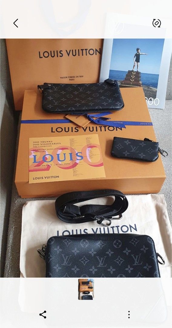 Louis Vuitton Trio Messenger Monogram Eclipse (Category: Luxury Bags & Wallets) located in Quezon City. Submitted by coolhorse.5862d3 (Listing ID 1466656073, Image 1). Description: - Brand: Louis Vuitton Trio Messenger - Material/Color: Monogram Eclipse canvas (Dark Grey and Black) - Includes: Main messenger bag, detachable zip pouch, and small coin purse - Accessories: Adjustable black strap and dust bag - Packaging/Extras: Large orange gift box