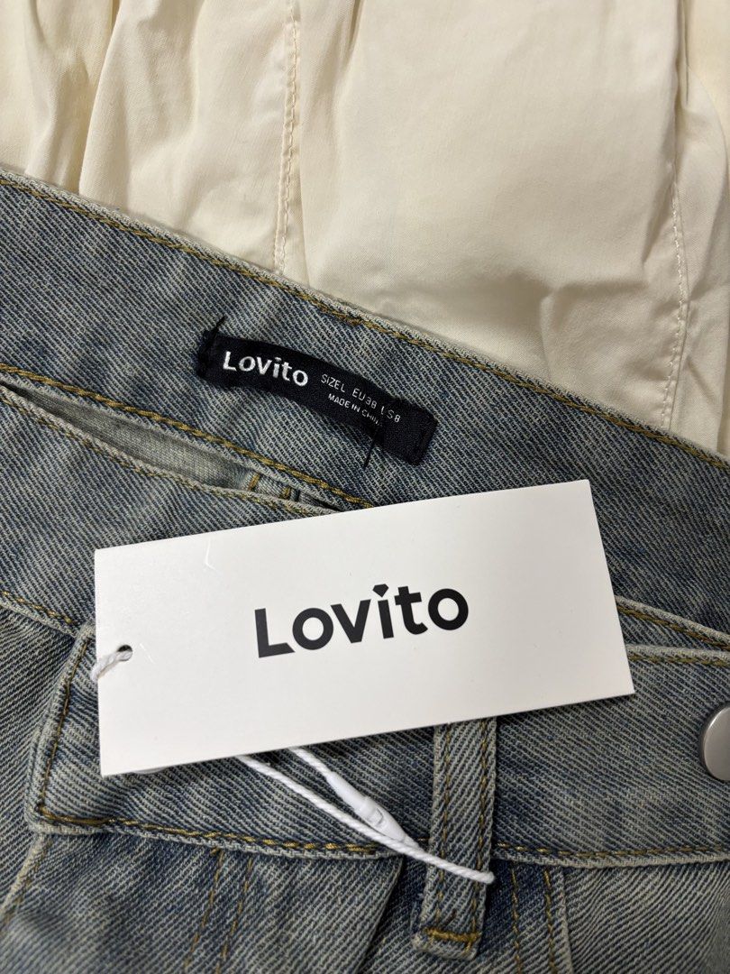 Lovito Denim Split Midi Skirt Size L (Category: Skirts) located in Pasay City. Submitted by altheatheaaeia (Listing ID 1466683049, Image 2). Description: - Brand: Lovito - Item: Denim midi skirt - Color/Wash: Grey wash with vintage fading - Size: L (EU 38, S 8) - Details: High waist, button fly, front slit with raw frayed edges - Condition: Brand new with tags attached.