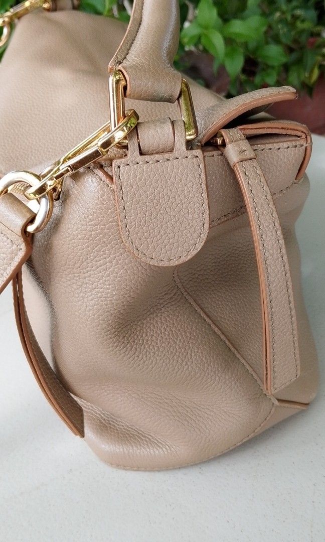 Lowww puzzle bag (Category: Luxury Bags & Wallets) located in Davao. Submitted by find.luxe (Listing ID 1466652333, Image 3). Description: self authentication medium.