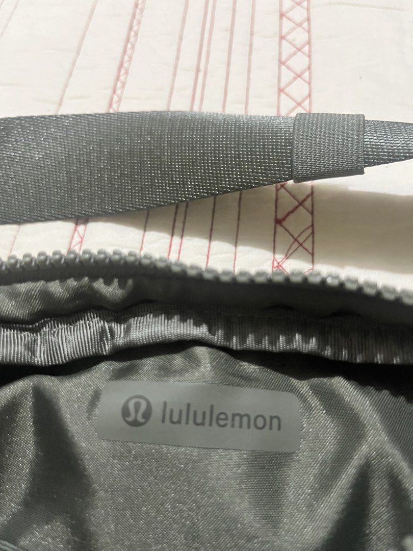 Lululemon Everywhere Belt Bag (Category: Belt bags, Clutches and Pouches) located in Manila. Submitted by lucky.beyaaa (Listing ID 1466705255, Image 1). Description: - Brand: Lululemon - Color: olive green - Features: Adjustable strap with elastic keeper, main zip compartment, interior mesh pockets, and classic logo patch - Condition: Excellent, clean interior and exterior .