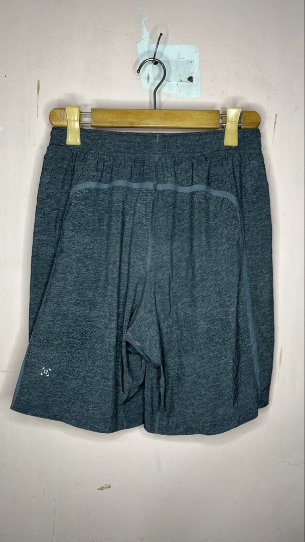 Lululemon Men's Grey Athletic Shorts (Category: Shorts) located in Mangaldan. Submitted by shortavenue (Listing ID 1466597449, Image 2). Description: Size 30-36 Length 19 Grey heathered Lululemon athletic shorts with an elastic waistband. Zippered pockets on both sides. Breathable fabric. Iconic Lululemon logo printed on the back leg. Comfortable fit for running, gym sessions, or casual wear..