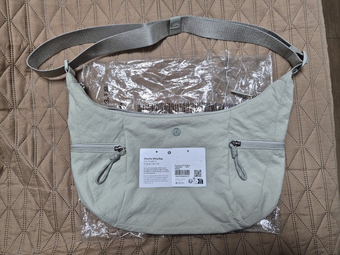 Lululemon Slouchy Sling Bag (6L) (Category: Cross-body Bags) located in Manila. Submitted by kimfl (Listing ID 1466719509, Image 1). Description: RFS: Decluttering Color: Light Ivory in Silver Hardware.