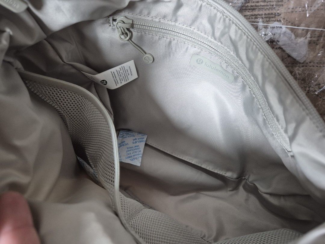 Lululemon Slouchy Sling Bag (6L) (Category: Cross-body Bags) located in Manila. Submitted by kimfl (Listing ID 1466719509, Image 3). Description: RFS: Decluttering Color: Light Ivory in Silver Hardware.