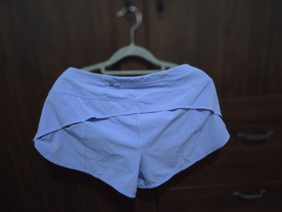 Lululemon Speed Up Athletic Shorts Light Purple (Category: Shorts) located in Quezon City. Submitted by sashasarisarishoppe (Listing ID 1466677260, Image 2). Description: - Authentic Lululemon athletic shorts - Color: Light purple / Lavender - Features: Built-in liner, secure zippered back pocket, and reflective logo - Fit: Mid-rise with a comfortable wide waistband - Ideal for: Running, gym workouts, and active lifestyle - Condition: Excellent, 