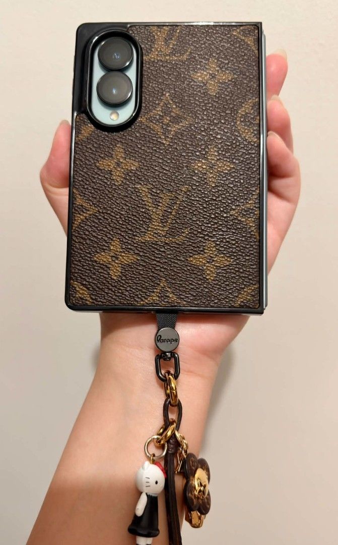 LV Monogram Pattern Phone Case for Z fold 8 (Category: Cases & Sleeves) located in Quezon City. Submitted by sashasarisarishoppe (Listing ID 1466683945, Image 3). Description: - Trendy monogram pattern phone case - Designed with a dual vertical camera cutout - Adds a stylish and decorative look to your everyday phone setup - Customize for Z Fold 8 - Haven't Used - Case only (accessories not included).
