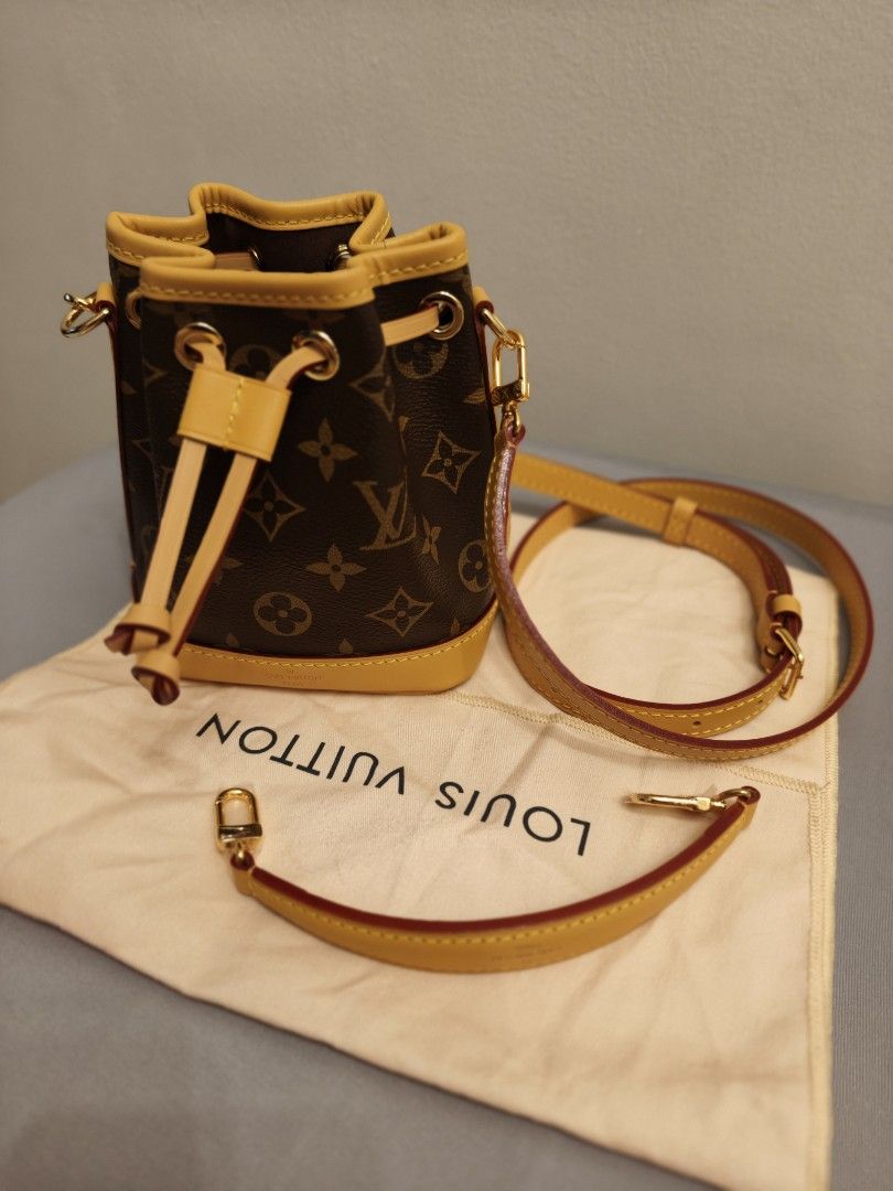 LV Nano Noe Monogram Canvas Bucket Bag (Category: Luxury Bags & Wallets) located in Antipolo. Submitted by jarazote (Listing ID 1466659632, Image 1). Description: Louis Vuitton Monogram canvas bucket bag with yellow leather trim. Drawstring closure on top. Includes detachable yellow leather strap and dust bag. Interior lined in dark fabric. Monogram pattern all over.No auth card .