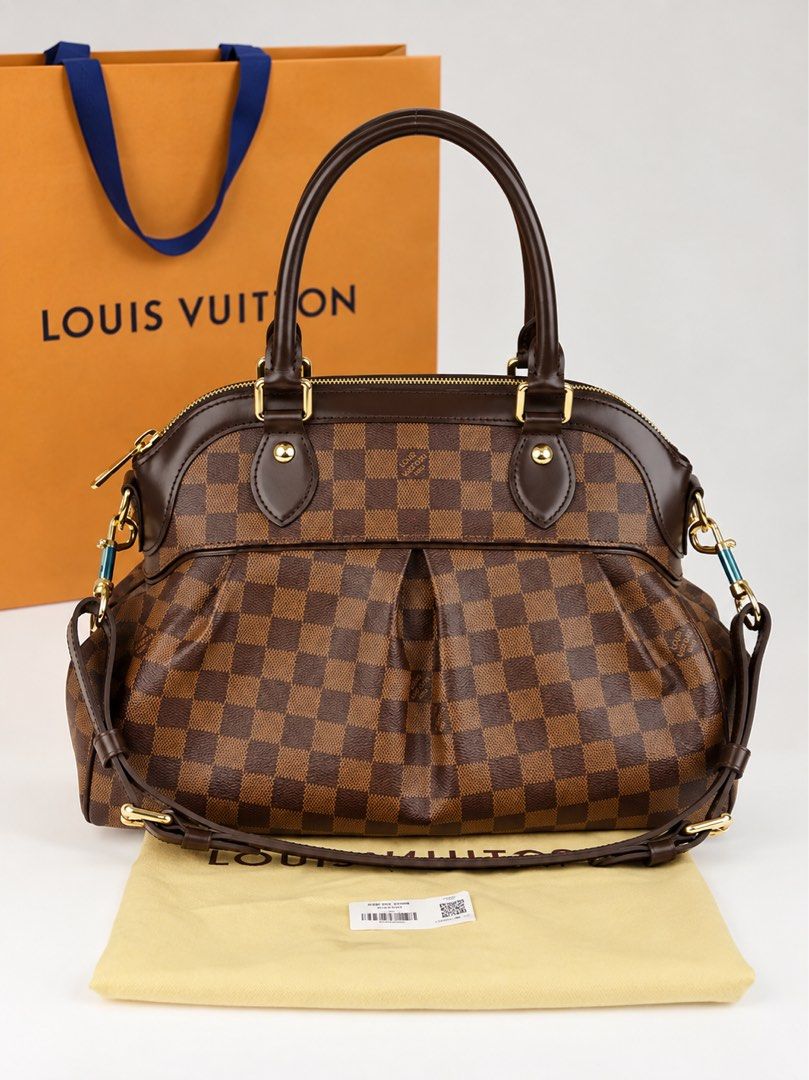 LV TREVI PM- Damier Ebene (Category: Shoulder Bags) located in Makati City. Submitted by lambogirl (Listing ID 1466733754, Image 1). Description: ✔️comes with strap, dust bag and entrupy ✔️Free shipping/ pick up (Makati).